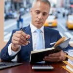 Focused Businessman Planning in Urban Office